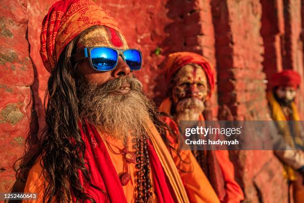sadhu - indian holymen sitting in the temple - sadhu stock pictures, royalty-free photos & images