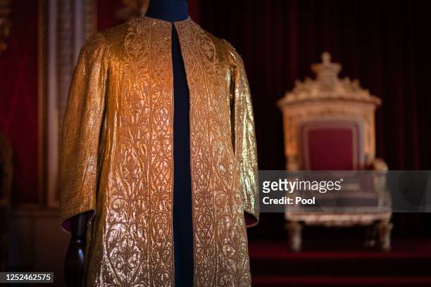 Detail is shown of the Supertunica which forms part of the Coronation Vestments, displayed in the Throne Room at Buckingham Palace on May 1, 2023 in...