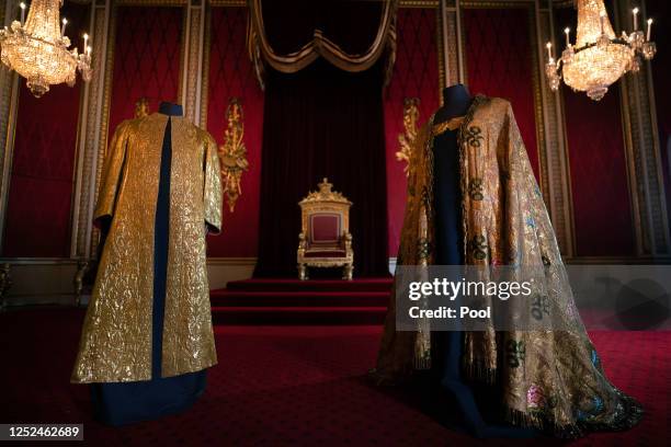 The Coronation Vestments, comprising of the Supertunica and the Imperial Mantle , displayed in the Throne Room at Buckingham Palace on May 1, 2023 in...