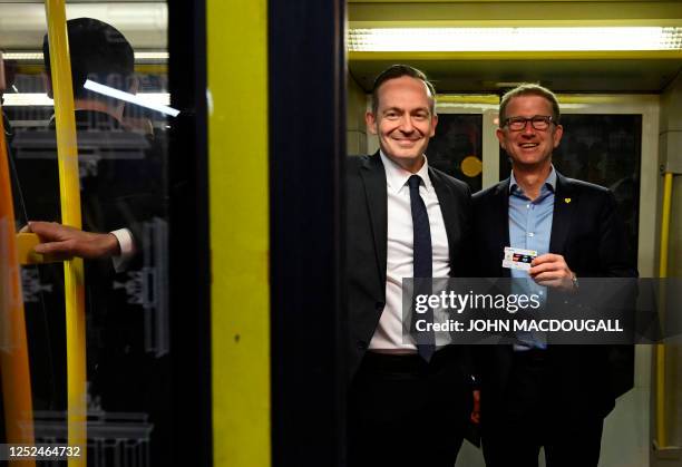 German Minister for Transport and Digital Affairs Volker Wissing and Rolf Erfurt , Director of Operations at Berlin's public transport company BVG ,...