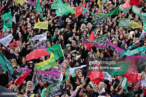 Participants of the birthday event of the Islamic Prophet Muhammad held at Newroz Park are seen waving flags. The birth of the Islamic Prophet...