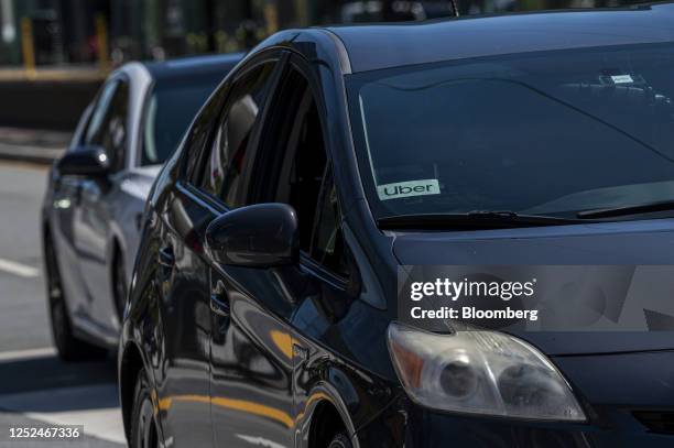 Uber signage on a vehicle in San Francisco, California, US, on Thursday, April 27, 2023. Uber Technologies Inc. Is expected to release earnings...