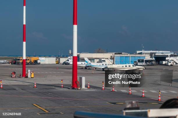 Smaller propeller aircraft at the tarmac of apron area of Thessaloniki International Airport Makedonia in Greece SKG LGTS as seen on March 2023. The...