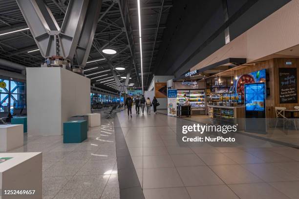 Shops with local products and international brands, Duty Free shops, bars, cafe, restaurants and lounges at the departure level with the boarding...
