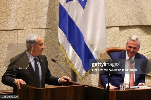 Speaker of the House Kevin McCarthy listens to a speech by Israeli Prime Minister Benjamin Netanyahu during a special sitting at the Knesset, the...