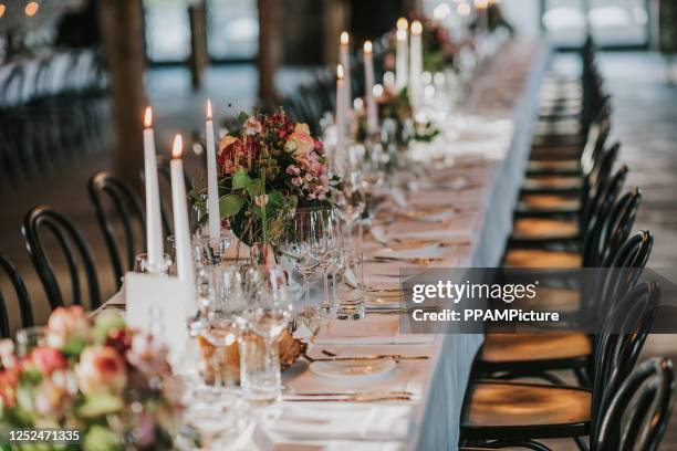 dinner table - big wedding reception stock pictures, royalty-free photos & images