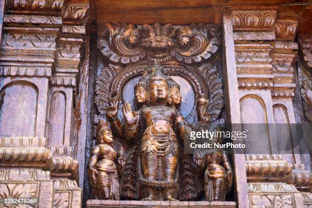 Detail of the elaborate carvings adorning the wooden base of the Thyagaraja Shiva Temple chariot in Thiruvarur , Tamil Nadu, India. The temple...