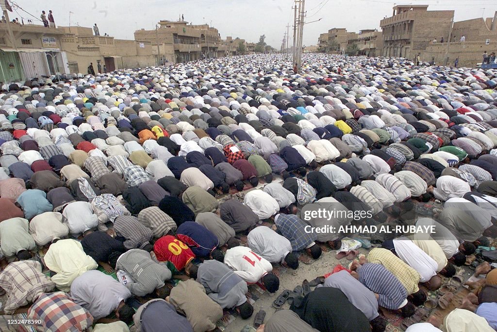 Muslims In Iraq TOPSHOT - Iraqi Shiite Muslims pray at a mosque in the Baghdad... News ...