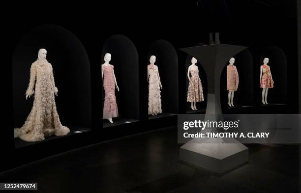 Dresses designed by Karl Lagerfeld are on display during the press preview of The Costume Institute's exhibition titled Karl Lagerfeld: A Line of...