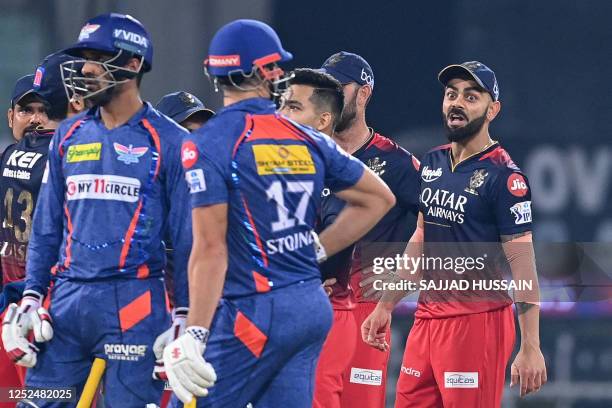 Royal Challengers Bangalore's Virat Kohli gestures during the Indian Premier League Twenty20 cricket match between Lucknow Super Giants and Royal...