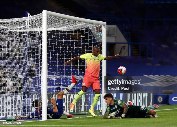 Fernandinho of Manchester City blocks the ball with his hand resulting in a red card and a penalty during the Premier League match between Chelsea FC...