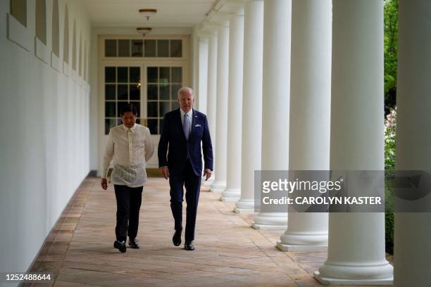 Philippine President Ferdinand Marcos Jr. And US President Joe Biden walk up the West Wing colonnade on their way to the Oval Office at the White...