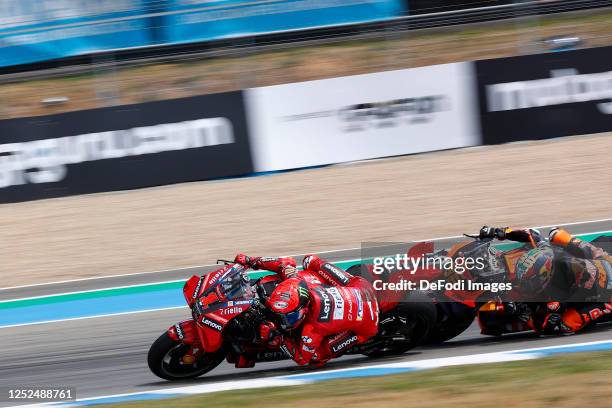 Francesco Bagnaia of Italy and Ducati Lenovo Team, Brad Binder of South Africa and Red Bull KTM Factory Racing leads the field during the MotoGP Of...