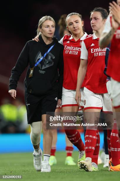The injured Leah Williamson of Arsenal Women with her team mates after losing 2-3 in the second leg and 4-5 on aggregate during the UEFA Women's...
