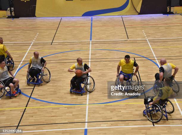 Veterans of the Russian-Ukrainian war compete in wheelchair basketball during the Invincible Games in Lviv, Ukraine on April 29, 2023. The Invincible...