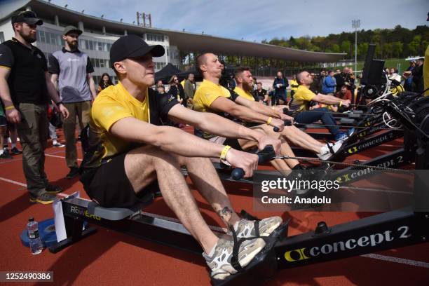 Veterans of the Russian-Ukrainian war take part in a rowing competition on simulators during the "Invincible Games" competition in Lviv, Ukraine on...