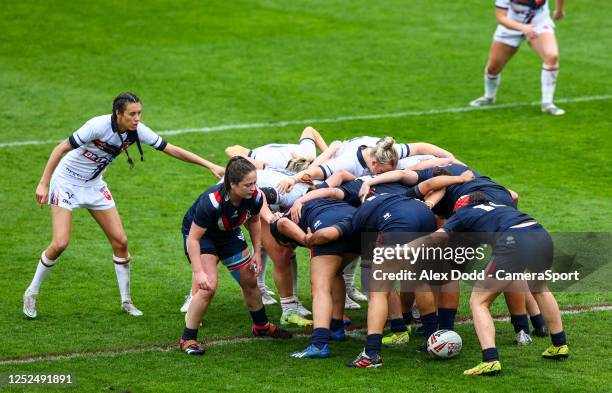 England and France take part in a scrum during the Mid-Season Internationals Rugby League match between England Women and France Women at The...