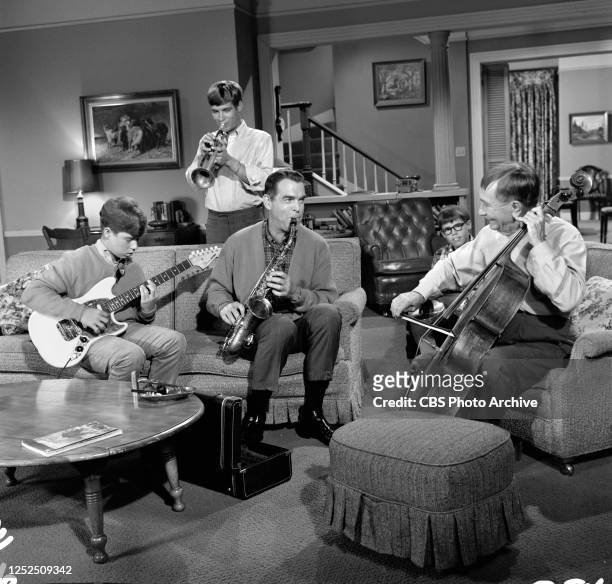 My Three Sons. A CBS television family sitcom. Episode, Fiddler Under the Roof. Originally broadcast November 10, 1966. Pictured from left is Barry...