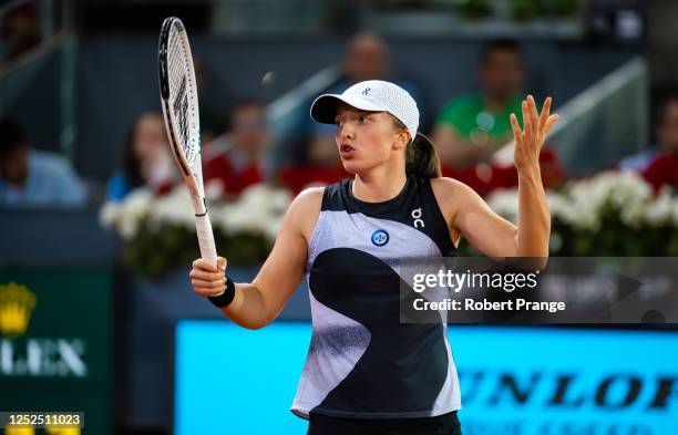 Iga Swiatek of Poland in action against Ekaterina Alexandrova of Russia in the fourth round on Day Eight of the Mutua Madrid Open at La Caja Magica...