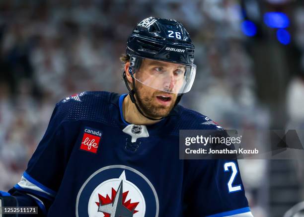 Blake Wheeler of the Winnipeg Jets looks on during a second period stoppage of play against the Vegas Golden Knights in Game Four of the First Round...