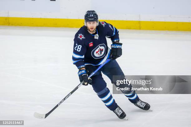 Kevin Stenlund of the Winnipeg Jets skates during third period action against the Vegas Golden Knights in Game Four of the First Round of the 2023...