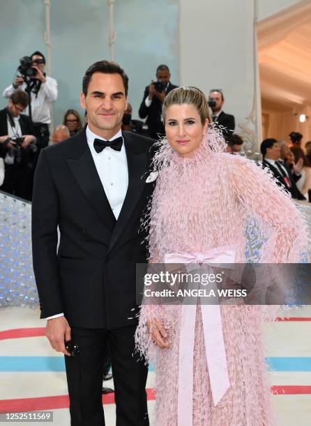 Swiss tennis player Roger Federer and his wife Mirka Federer arrive for the 2023 Met Gala at the Metropolitan Museum of Art on May 1 in New York. -...