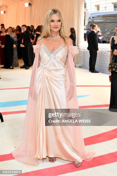 English model Kate Moss arrives for the 2023 Met Gala at the Metropolitan Museum of Art on May 1 in New York. - The Gala raises money for the...