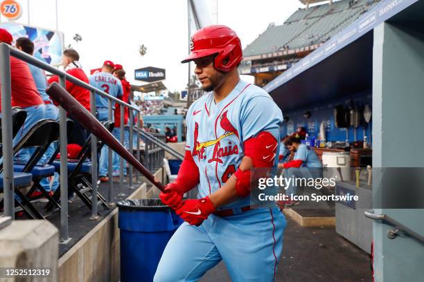 St. Louis Cardinals designated hitter Willson Contreras walks through the dugout to the on deck circle during a regular season game between the St....