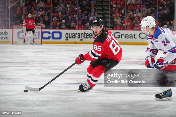 Jack Hughes of the New Jersey Devils skates in the first period of Game Seven of the First Round of the 2023 Stanley Cup Playoffs against the New...