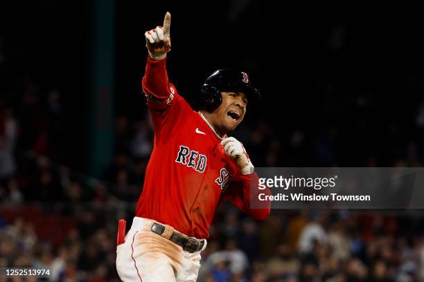 Enmanuel Valdez of the Boston Red Sox celebrates as he rounds the bases after his two-run home run against the Toronto Blue Jays during the sixth...