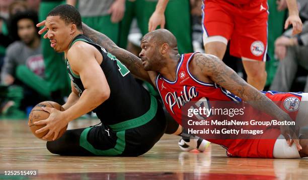 Tucker of the Philadelphia 76ers tries to grab the ball from Grant Williams of the Boston Celtics during the first half of Game 1 of the NBA Eastern...