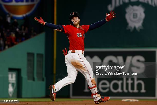 Alex Verdugo of the Boston Red Sox looks toward his dugout as he celebrates his walk-off home run against the Toronto Blue Jays during the ninth...