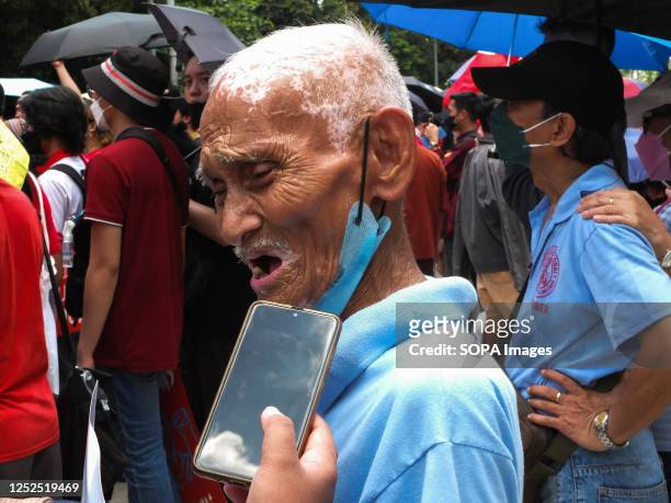 Year-old jeepney driver Elmer Cordero is being interviewed by media personnel during the demonstration. Progressive groups protested in front of the...