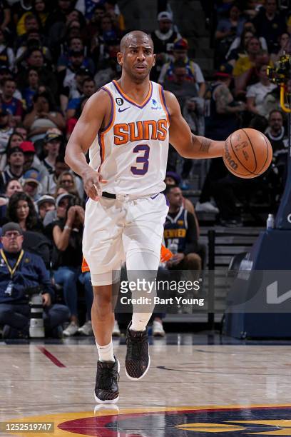 Chris Paul of the Phoenix Suns dribbles the ball against the Denver Nuggets during Round 2 Game 2 of the 2023 NBA Playoffs on May 1, 2023 at the Ball...