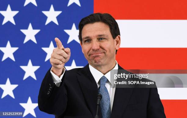 Florida Governor Ron DeSantis calls on a member of the media at a press conference at the American Police Hall of Fame & Museum in Titusville....