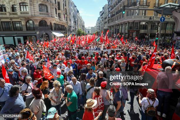 Thousands of protesters march along Gran Via Street during the demonstration. Workers' unions have demonstrated through the streets of downtown...