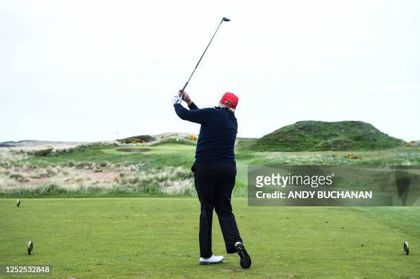 Former US President Donald Trump plays golf at the Trump Turnberry Golf Courses, in Turnberry on the west coast of Scotland on May 2 during the...