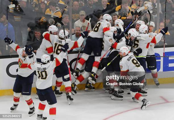 Boston, MA Florida Panthers players celebrate their overtime win. The Panthers beat the Boston Bruins, 4-3, in Game 7 of their Eastern Conference...