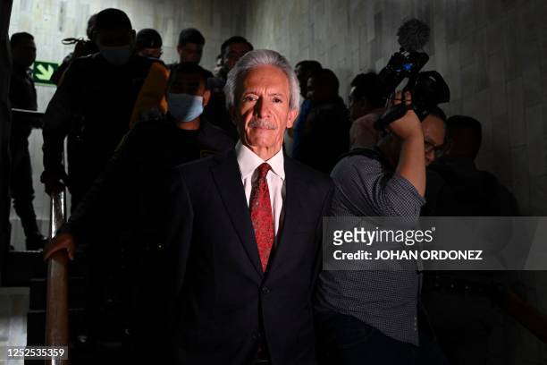 Guatemalan journalist Jose Ruben Zamora, president of the newspaper El Periodico, attends a hearing at the Justice Palace in Guatemala City on May 2,...