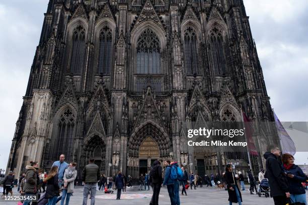 Tourists outside Cologne Cathdreal on 6th April 2023 in Cologne, Germany. Cologne Cathedral is a church in the gothic style in North Rhine-Westphalia...