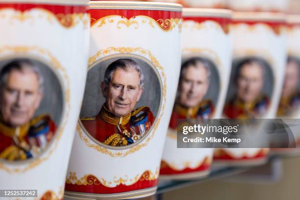 King Charles III Coronation merchandise on sale in a souvenir shop on 20th April 2023 in London, United Kingdom. King Charles II will be crowned King...