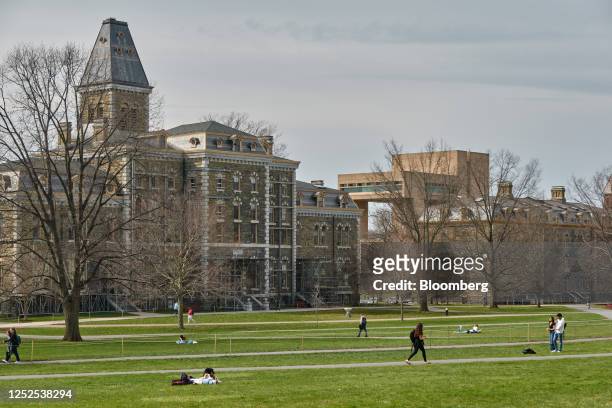 Students at the Cornell University campus in Ithaca, US, on Tuesday, April 11, 2023. US college costs just keep climbing and the increase is pushing...