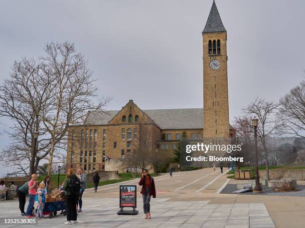 McGraw Tower and Uris Library at the Cornell University campus in Ithaca, US, on Tuesday, April 11, 2023. US college costs just keep climbing and the...