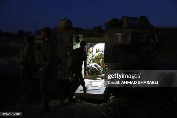 Israeli soldiers deploy along the Gaza border on May 2, 2023. - The Israeli military traded fire with Gaza militants in a flare-up of violence...