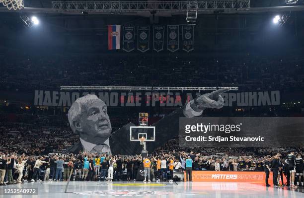 Supporters of Partizan raise a banner with Head coach Zeljko Obradovic prior to the the 2022/2023 Turkish Airlines EuroLeague Play Offs Game 3 match...
