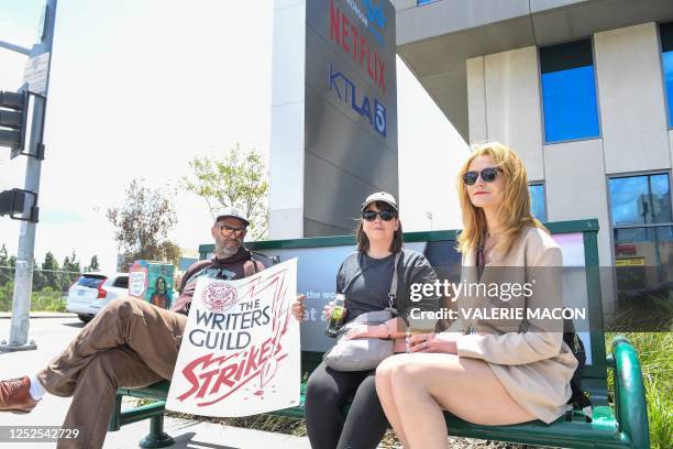 Screenwriter on strike prepare to picket by the Netflix sign on Sunset Blvd, on May 02, 2023 in Los Angeles, California. - More than 11,000 Hollywood...