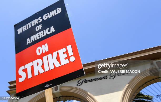 Screenwriters on strike protest in front of Paramount Studios on May 2, 2023 in Los Angeles, California. - More than 11,000 Hollywood television and...