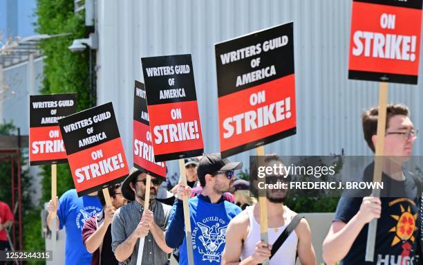 Writers picket in front of Netflix on Sunset Boulevard in Hollywood, California, on May 2, 2023 as the Writers Guild of American goes on strike. -...