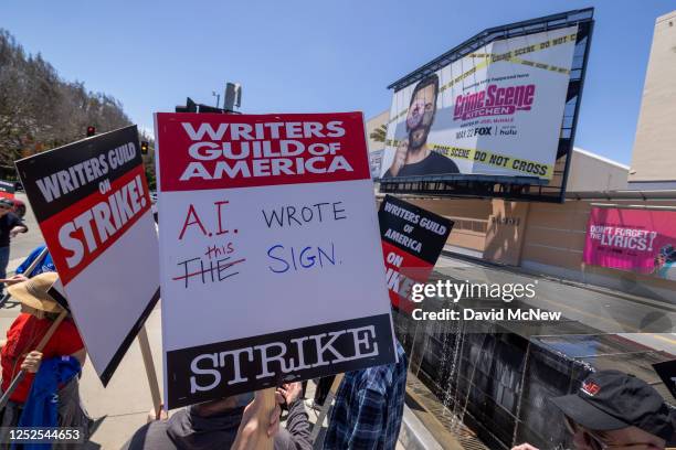 People picket outside of FOX Studios on the first day of the Hollywood writers strike on May 2, 2023 in Los Angeles. Scripted TV series, late-night...