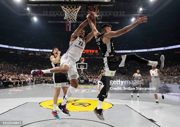 Walter Tavares of Real Madrid is challenged by Aleksa Avramovic of Partizan during the 2022/2023 Turkish Airlines EuroLeague Play Offs Game 3 match...